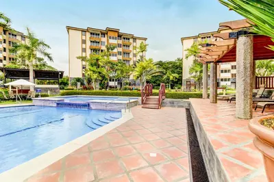 an image of a swimming pool at a resort at Costa Linda 2-28 in Jacó