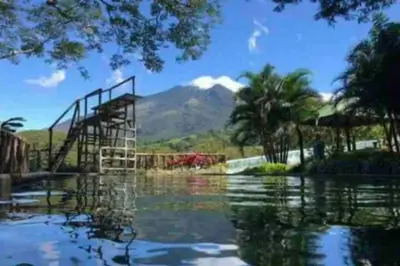 a water slide in the middle of a body of water at Casa San Gerardo in Bagaces