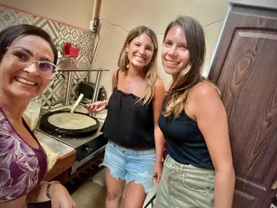 a couple of women standing in a kitchen at Chillout House in Monteverde Costa Rica