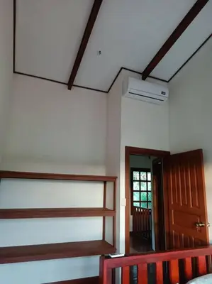 a room with a staircase and a room with a door at Manantial de Vida in Bejuco