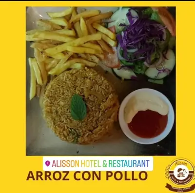 a plate of food with a sandwich and french fries at Alisson Hotel y Restaurant in Monteverde Costa Rica