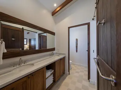 a bathroom with a sink and a large mirror at Plaza Mercado 24 At Las Catalinas in Playa Danta