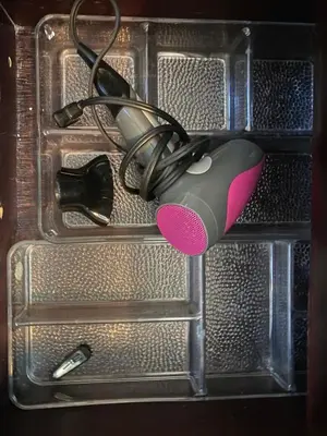a computer mouse and other items in a drawer at Jaco Hideaway Oasis in Jacó