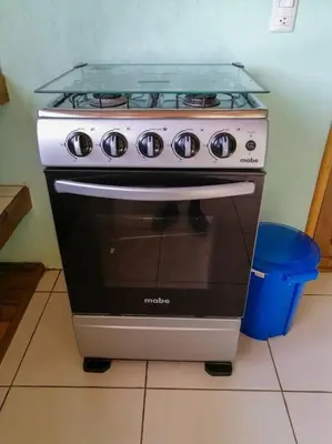 a stove in a kitchen with a glass top at Casa Beli in Monteverde Costa Rica