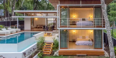 a modern house with a pool and a bedroom at Villa Laia - Santa Teresa in Santa Teresa Beach