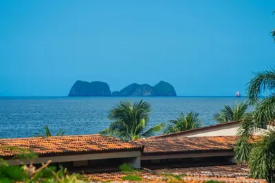 a view of the ocean from a resort at Villa Flamingo 8 At Playa Flamingo in Playa Flamingo