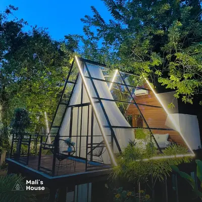 a modern house with a glass house at Mali's House in Fortuna