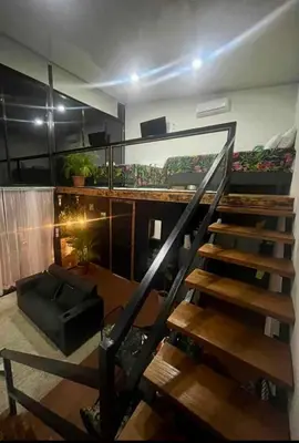 a room with a staircase in a house at Villa Aura in Fortuna