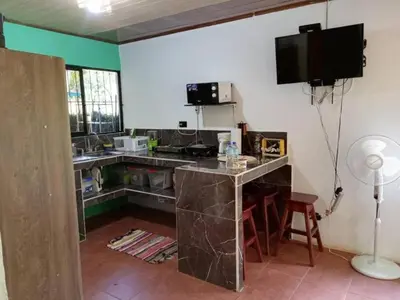 a kitchen with a sink and a counter top at La casita JSL in Ramos