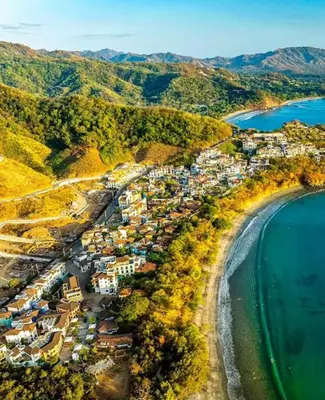 an aerial view of a village next to the water at Las Catalinas - Studio Cazenovia centrally located, short walk to beach in Playa Danta