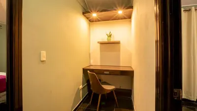a small room with a desk and a chair at Anthurium house in Fortuna