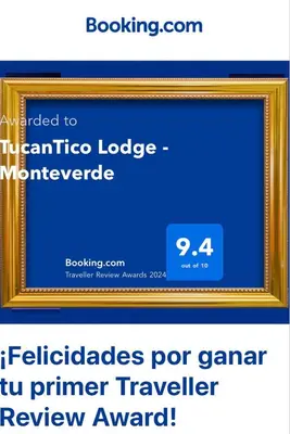 a picture of a picture frame with a sign that readsgraduate premier transfer transfer reward at TucanTico Lodge ~ Casa # 3 in Monteverde Costa Rica