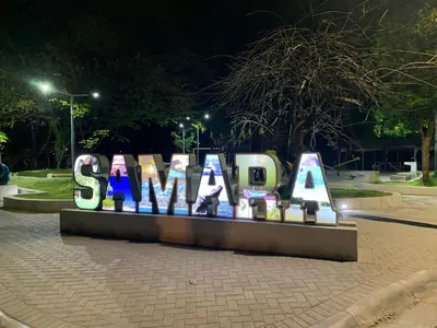 a sign that says santa ana in a park at night at Incroyable Villa HermoSamara in Sámara