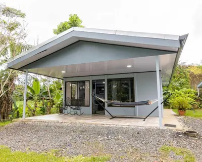 a glass house with a hammock in it at La Casa del Tío Carlos in San Pedro