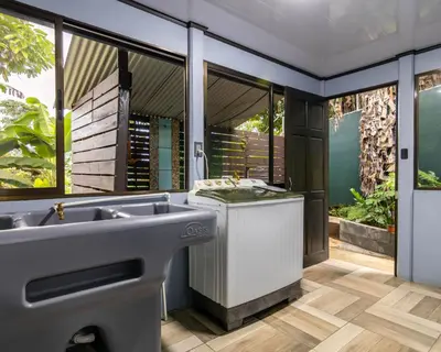 a bathroom with a sink and a large window at La Casa del Tío Carlos in San Pedro