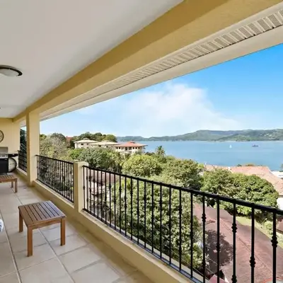 Remodeled Top-Floor Condo with Stunning Wrap-Around Balcony Offering Mountain