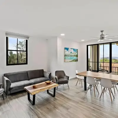Stunning Top-Floor Condo with Sweeping Ocean & Mountain Views & Beach Club