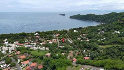 an aerial view of a town and a body of water at Bright and Spacious Loft-Style Apartment a Five-Minute Walk to the Beach in Coco
