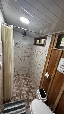 a bathroom with a toilet and a shower at Campo Azul #3 - Monteverde in Monteverde Costa Rica