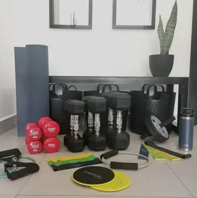 a counter top with a group of fitness equipment at Bright & Airy new Condo, 5 min walk to Jaco Beach! in Jacó