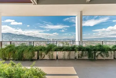 a balcony with a view of the mountains at Rooftop and city view Aparment in San José