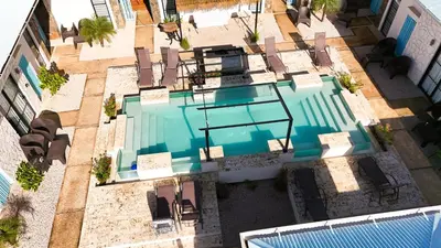 an overhead view of a swimming pool in a building at Villas VR Beachwalk Avellanas in Playa Avellana