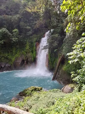 a waterfall on the side of a river at Casa areno lodge in Bijagua