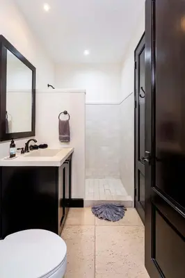 a bathroom with a toilet and a sink and a shower at Apartment Calle La Ronda At Las Catalinas in Playa Danta